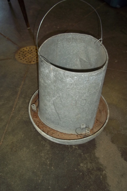 lot 75 image: Vintage Jolly brand hanging chicken feeder