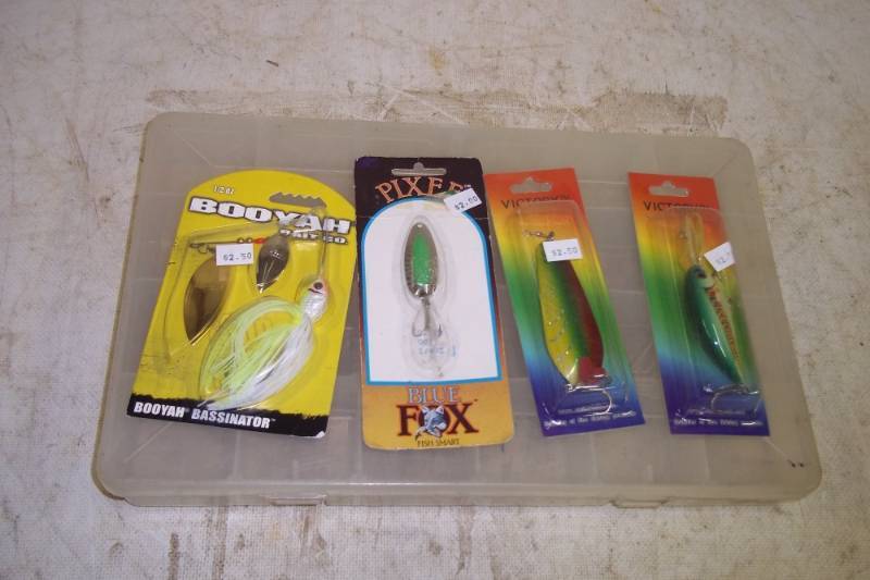lot 79 image: 4 Assorted lures with tackle box