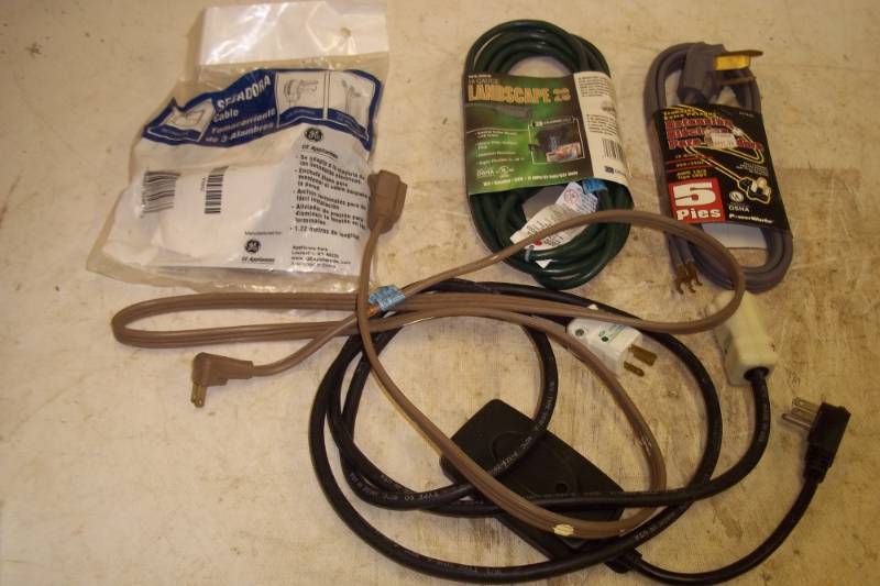 lot 100 image: Dryer cord, extension cord, misc. cords
