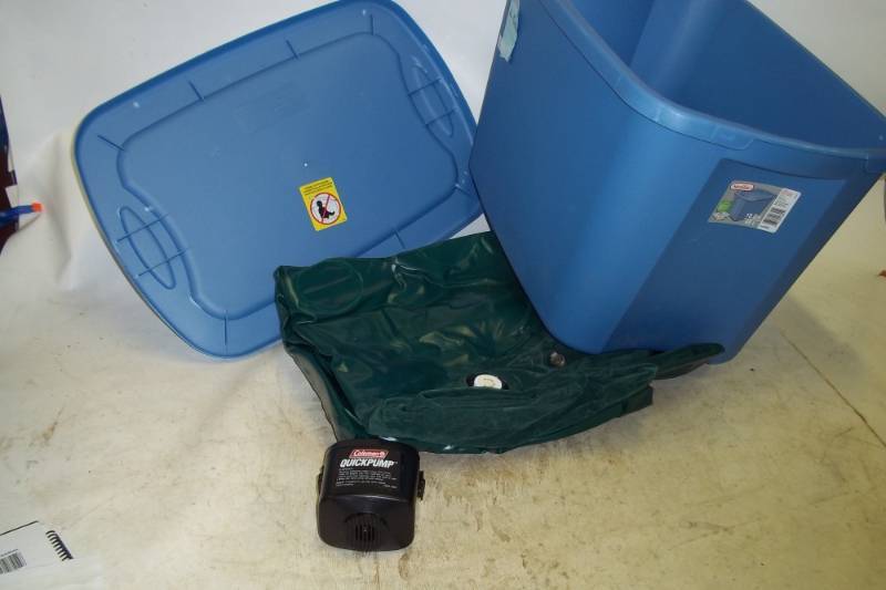 lot 106 image: Air mattress with air pump and plastic tote