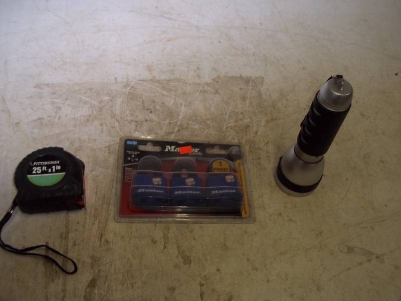 lot 107 image: Set of 3 Master locks, 25ft Tape measure, Flashlight with no batteries