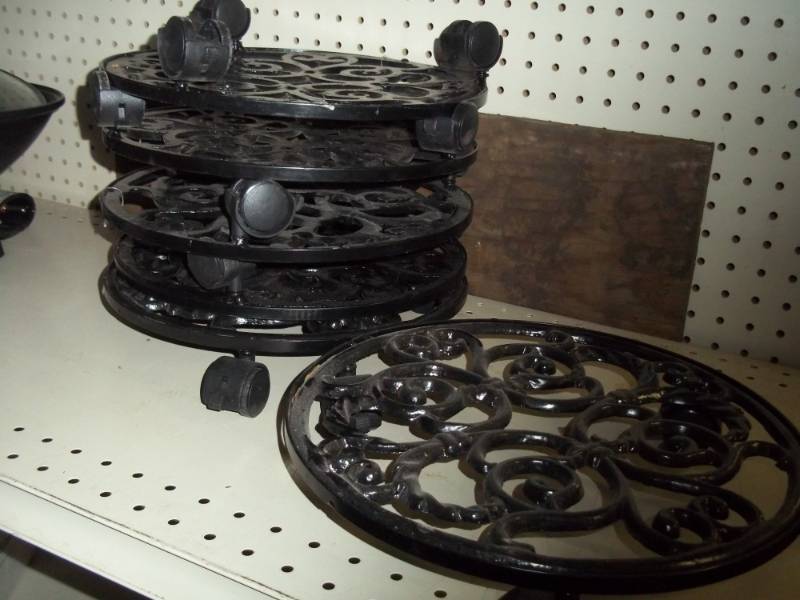 lot 219 image: 6 metal plant stand with wheels