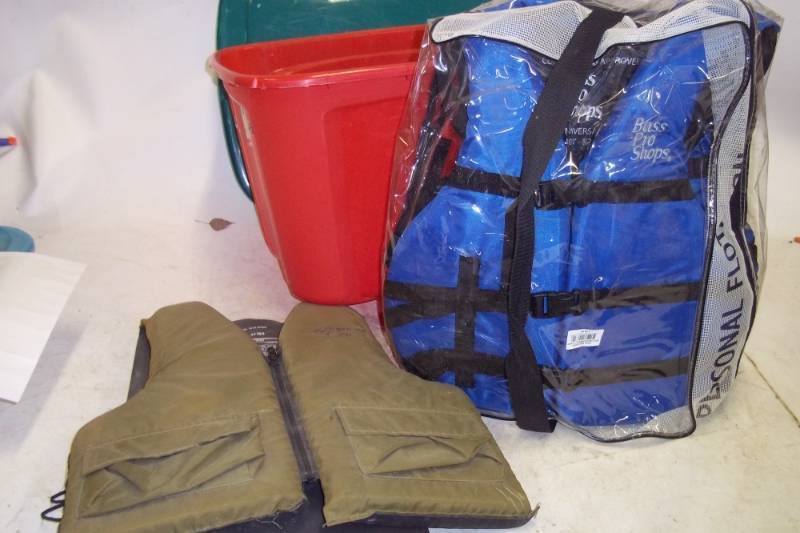lot 247 image: Storage Tote with 4 Life Jackets