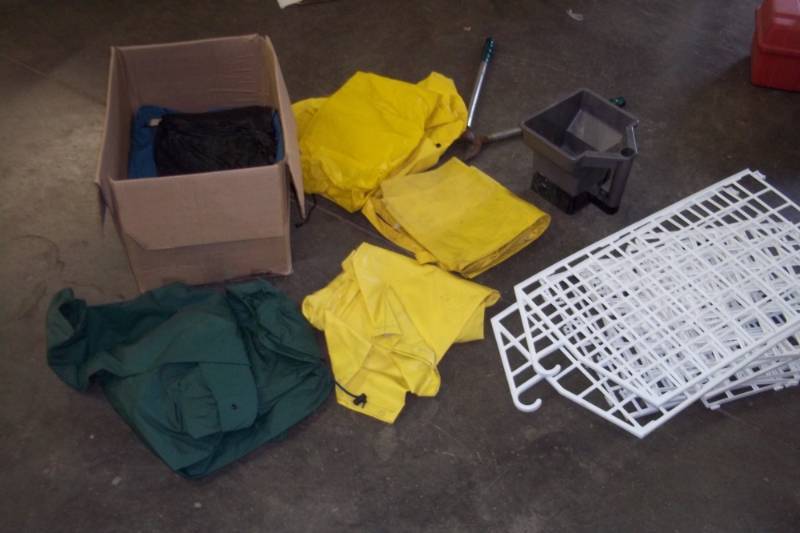 lot 307 image: Raingear, hanging shelfs, pruners and grass seeder