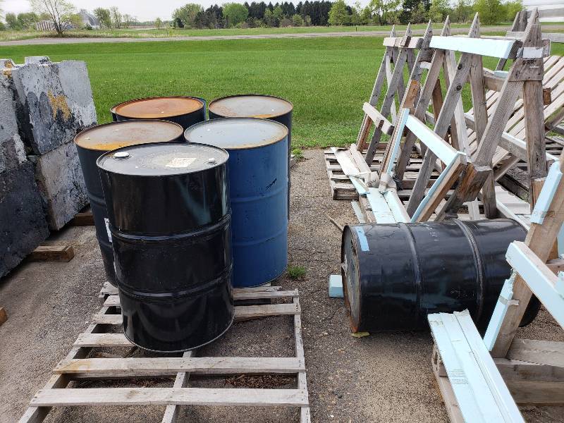 lot 130 image: (9) Steel 55 Gallon Barrels