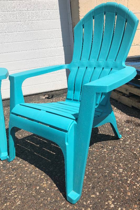 lot 11 image: Lot of (4) Teal Plastic Adirondack Patio Chairs