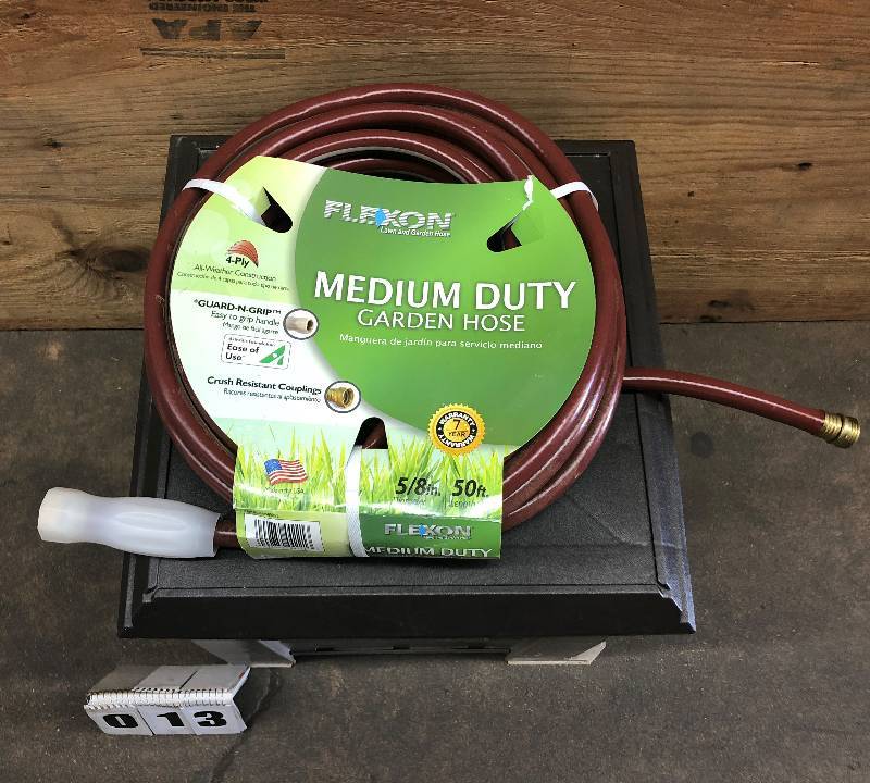 lot 13 image: Garden Hose Cabinet with Garden Hose
