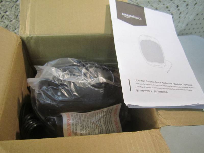 lot 76 image: Amazon Basics 1500-Watt Ceramic Spa...