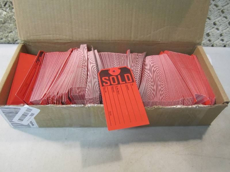 lot 99 image: Box of SOLD Tags  BS...