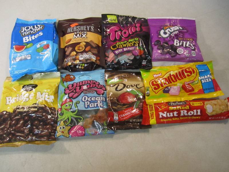 lot 159 image: Mixed Lot of 8 Bags and 1 Candy Bar...