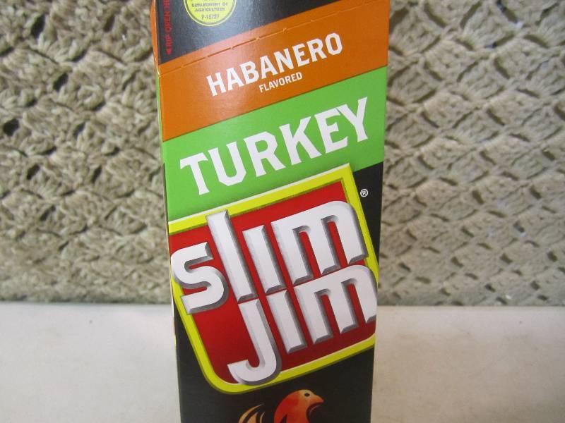 lot 279 image: Box of 24 Slim Jim Snack Sticks Hab...