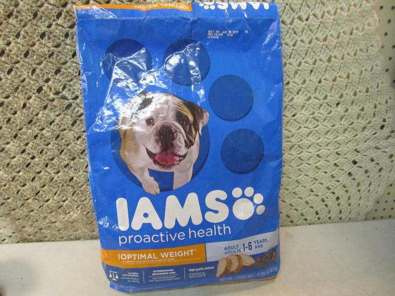 lot 305 image: 15 Pound Bag of Dog Food Best by Ju...