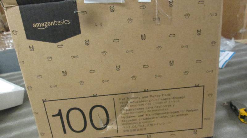 Amazon Basics 100 Puppy Pads 22x22...