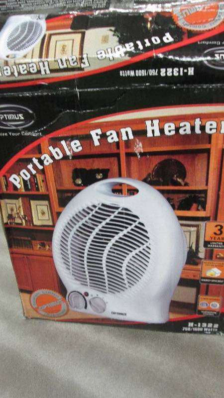 Optimus Portable Fan Heater, makes ...