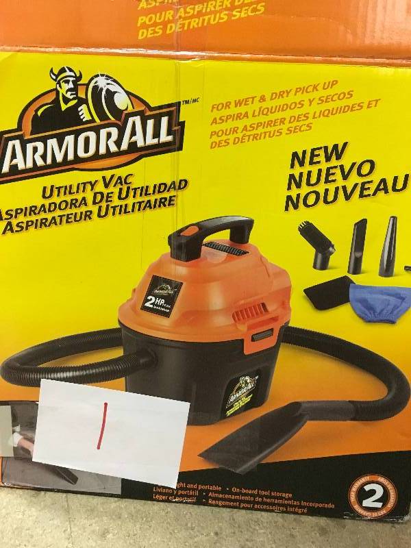 lot 1 image: ArmorAll 2.5-gal. WetDry Vacuum with 1.25 in. Hose and Accessories in like new condition