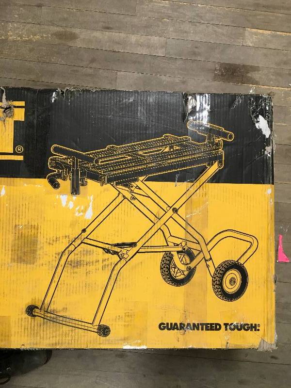 lot 47 image: Dewalt Rolling Universal Miter Saw Stand Dwx726 open box like new