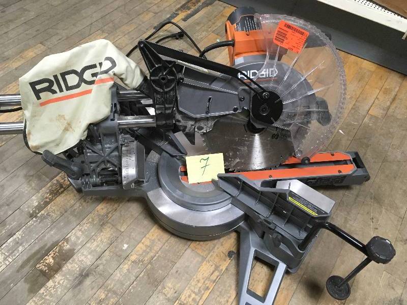 lot 7 image: RIDGID 15 Amp 12 in. Corded Dual Bevel Sliding Miter Saw  used in working condition