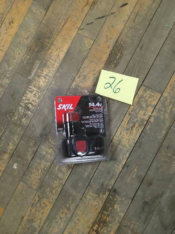 lot 26 image: SKIL 144BAT DUAL SOURCE BATTERY PACK, 14.4 VOLTS open box like new.