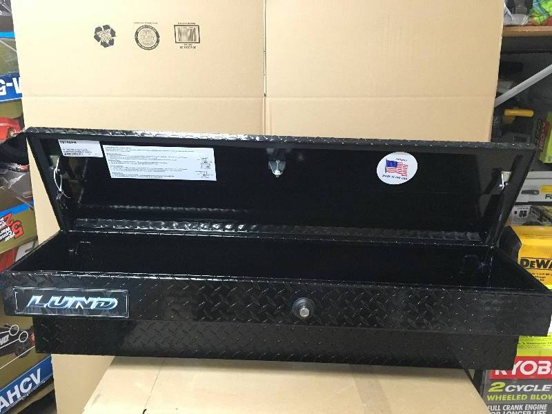 lot 54 image: Lund 48 in. Aluminum Side Mount Truck Tool Box Portable Storage Chest Black open box like new.