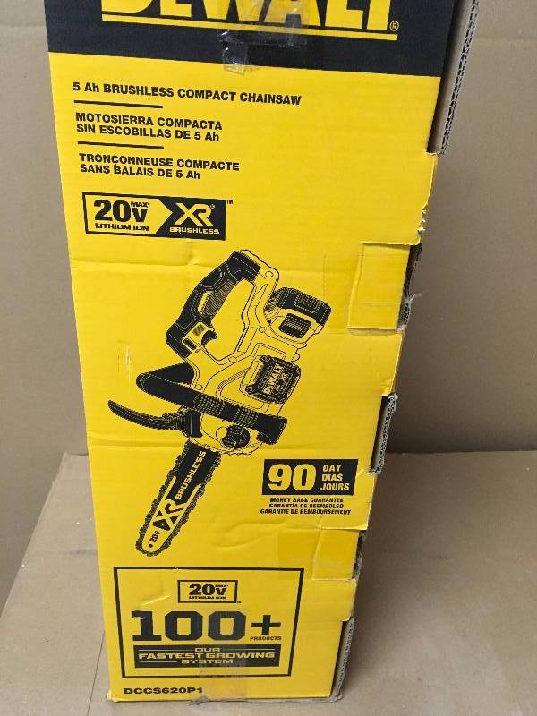 lot 56 image: DeWalt 20V Battery Powered Chainsaw 12 in. L(DCCS620P1) open box like new.