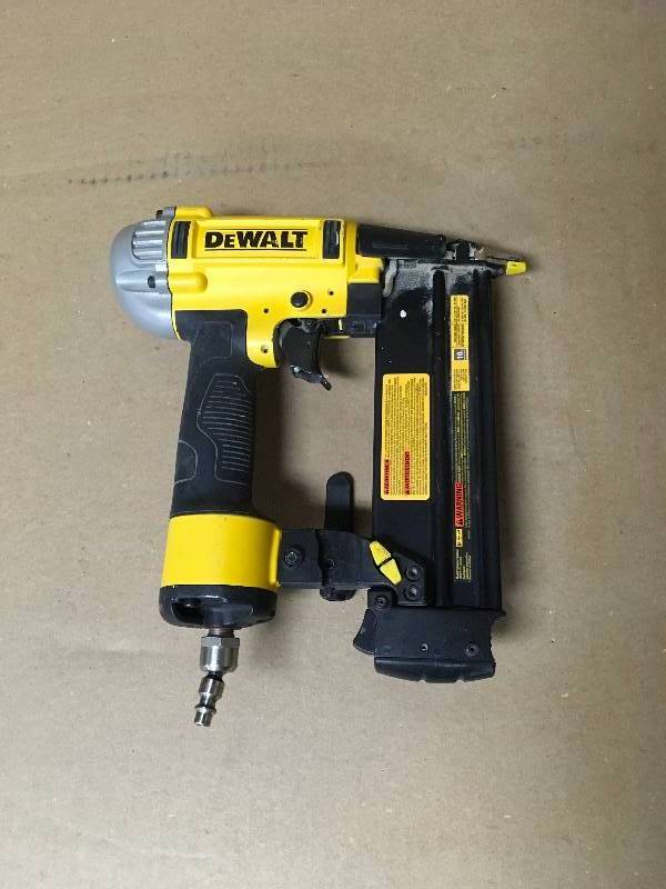 lot 75 image: DEWALT DWFP12233 Precision Point 18-gauge Air Brad Nailer used
