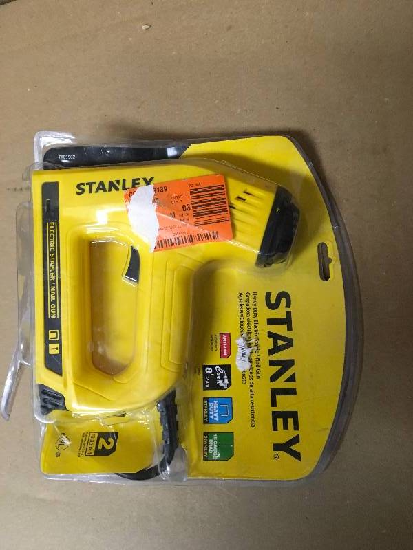 lot 83 image: STANLEY TRE550Z 2-in-1 Electric Stapler and Brad Nailer open box like new.