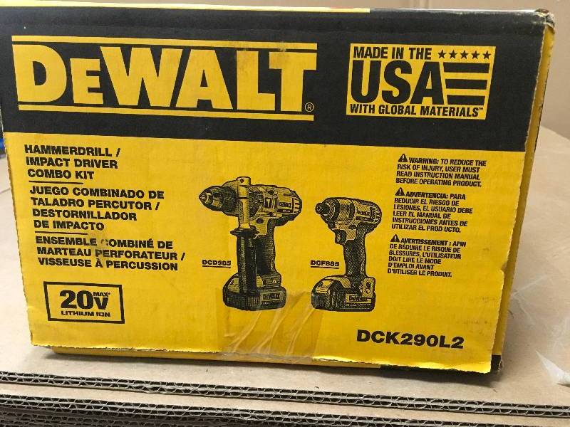 lot 99 image: DEWALT 20 Volt Max LithiumIon 2pc. tool combo includes a 20V Max 12in. cordless hammerdrill and a 20V Max 14in. cordless impact driver. Open box like new.