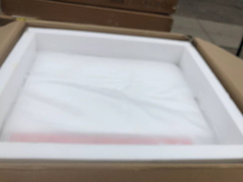 lot 64 image: Sonoma 24 in. W x 20.25 in. D Vanity in White with Natural Marble Vanity Top in White with White Basin not used