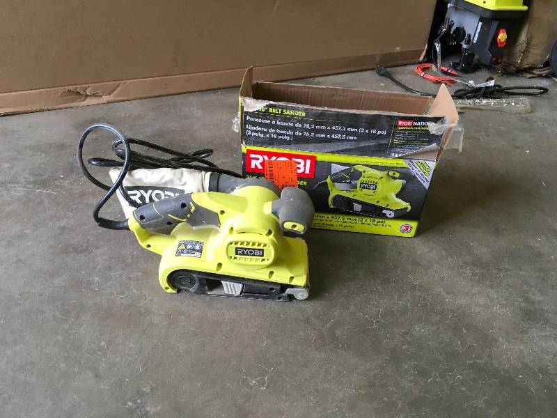 lot 79 image: Ryobi  3 in. x 18 in. Portable Belt Sander used in working condition
