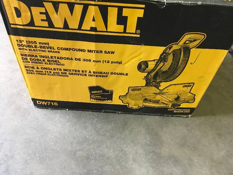 lot 83 image: DEWALT 15 Amp 12 in. Double-Bevel Compound Miter Saw in like new condition