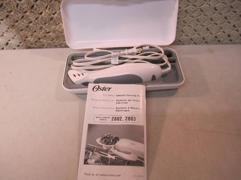 lot 26 image: Oster Electric Carving Knife Set in...