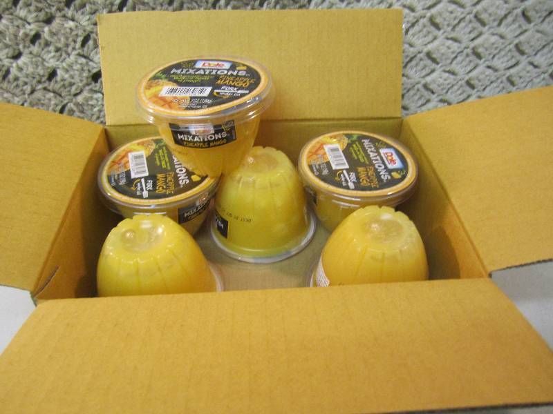 lot 76 image: Case of 12 Dole Mixations Pineapple...