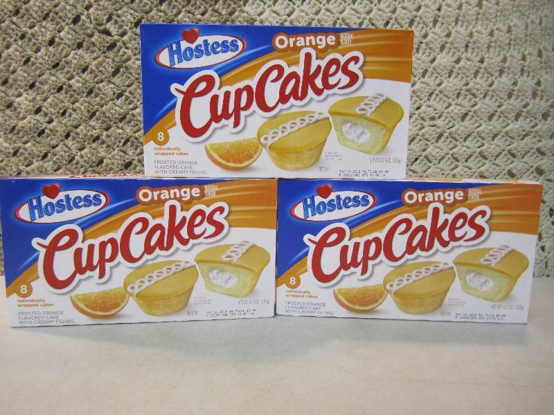 lot 100 image: 3 Boxes Hostess Orange Cup Cakes Be...