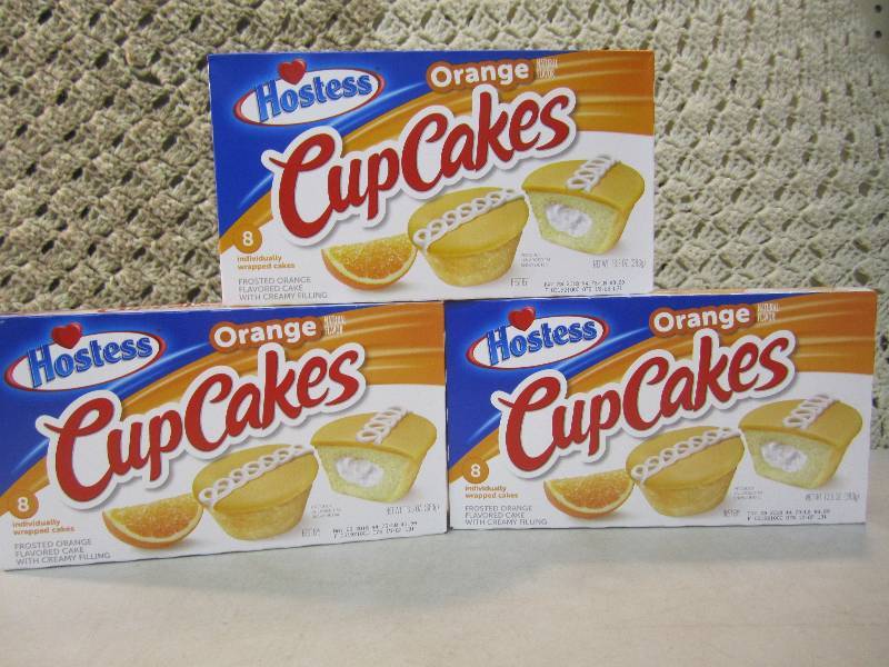 lot 101 image: 3 Boxes Hostess Orange Cup Cakes Be...