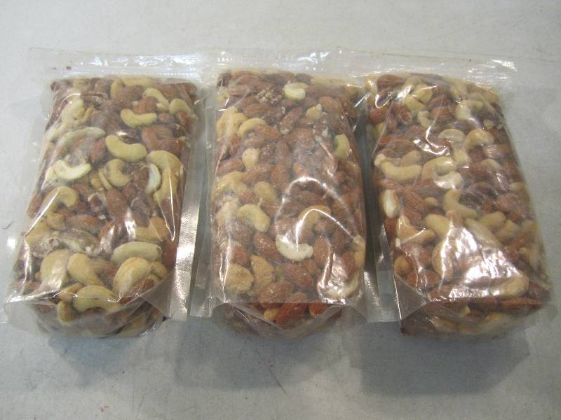 lot 117 image: 3 - 1 Pound Bags of Mixed Nuts  C-3...