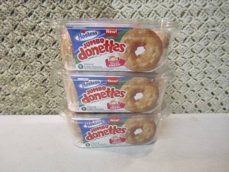 lot 118 image: 3 Packs Hostess Jumbo Donettes Glaz...