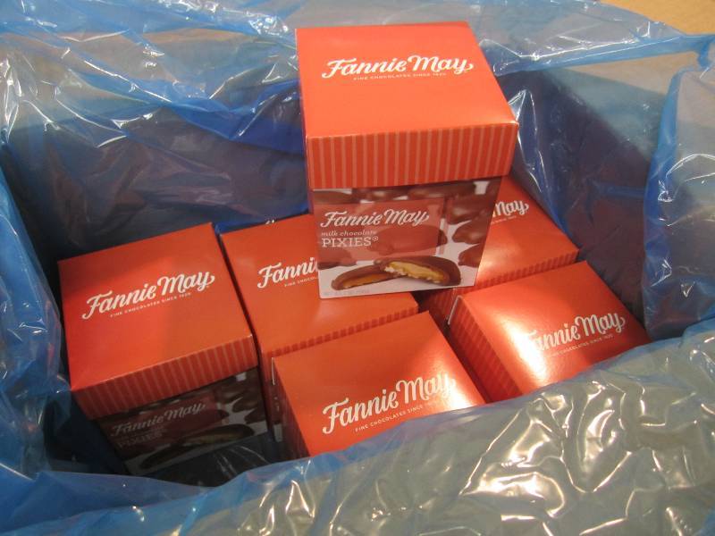 lot 126 image: Case of 6 Boxes Fannie May Milk Cho...