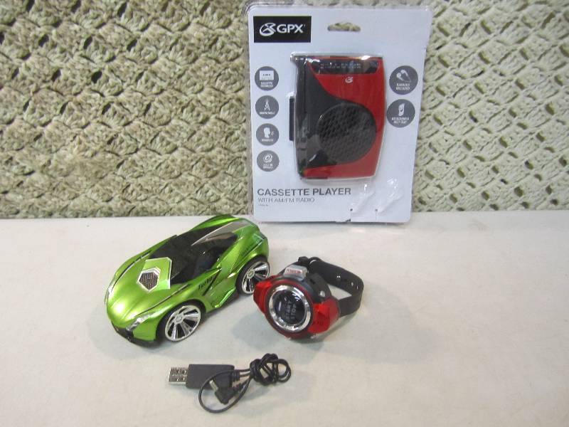 lot 202 image: Remote Control Car and Cassette Pla...
