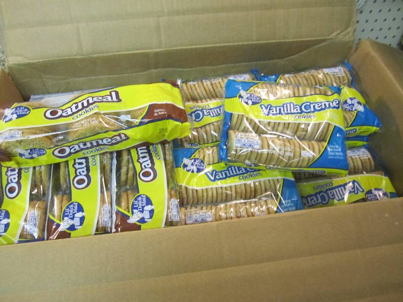 lot 216 image: 16 Packs of Cookies 8 of each. Vani...