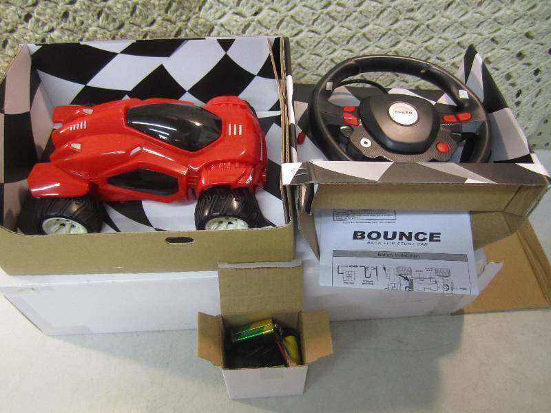 lot 285 image: Bounce Back Flip Stunt RC Car in R...