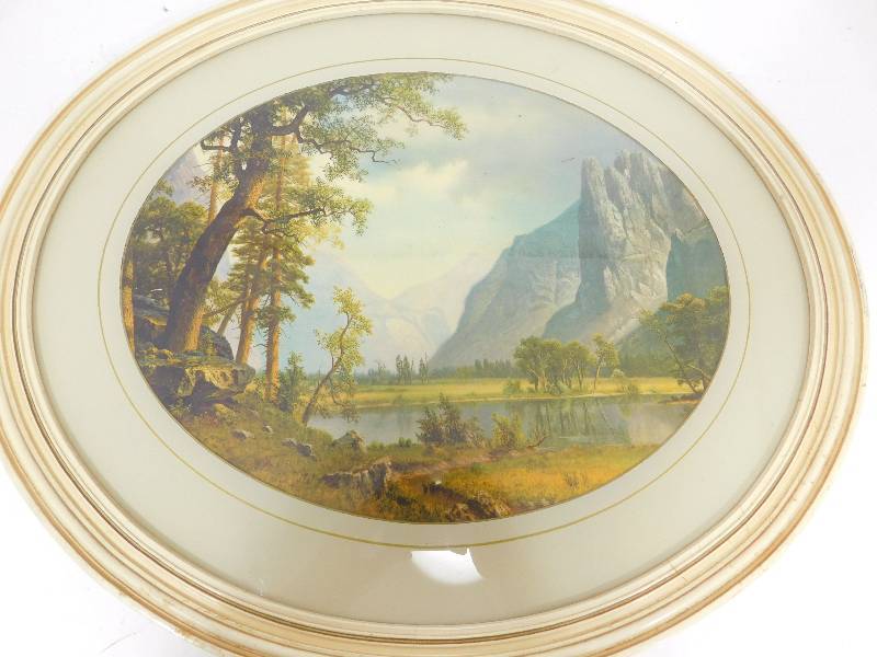 lot 57 image: Oval Frame With Mountain View Picture In It