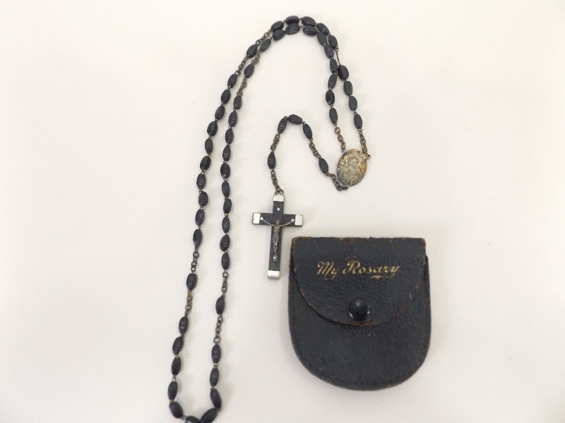 lot 28 image: Lot of Religious Relics, Rosary, and Charms