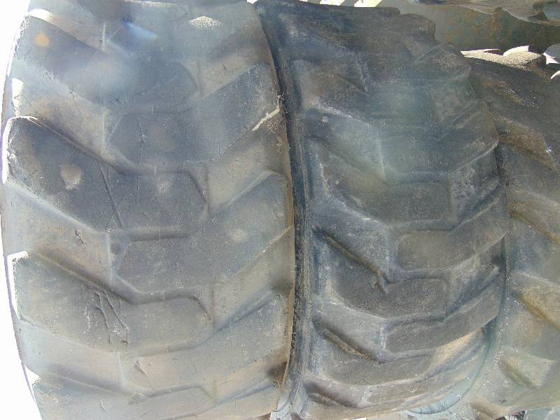 lot 21 image: (13) Used Skid Loader Tire 10-16.5
