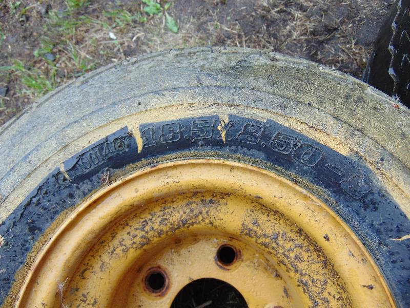 lot 27 image: (2) 18.5 x 8.5-8 Tire and Rim