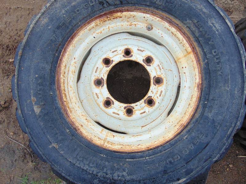 lot 31 image: (2) Tires and (1) Rim NHS