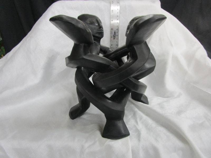 lot 30 image: Hand Carved Wood 4 Figures Intertwines