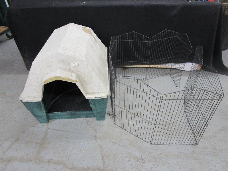 lot 50 image: Large Dog House with Heating pad in it and a fence for around the front of it for puppies