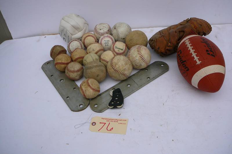 lot 76 image: Baseballs, football, catchers mit, counter