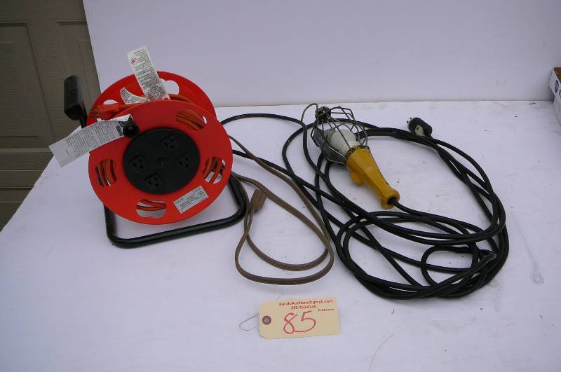 lot 85 image: Trouble light, Quad tap cord reel with extension cord, extension cord