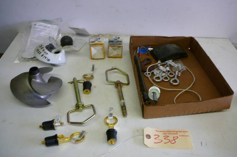 lot 338 image: Boat props- hitch pines, boat plugs- clamp-buoys